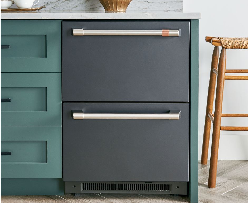 dishdrawer next to green cabinets